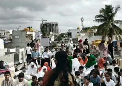 children, volunteers and community members
